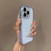 Blue clear iPhone case with camera cutout detail and cushioned edges