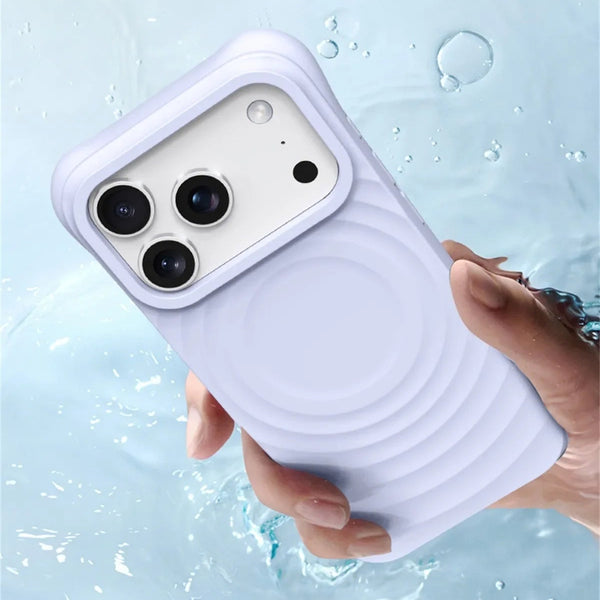 Phone case with text about washability and stain resistance, held by a hand against a water droplet background.
