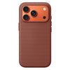 Close-up of brown woven iPhone case showing textured finish and raised camera frame