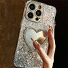 Back view of glitter mirror iPhone case with heart-shaped reflective cutout