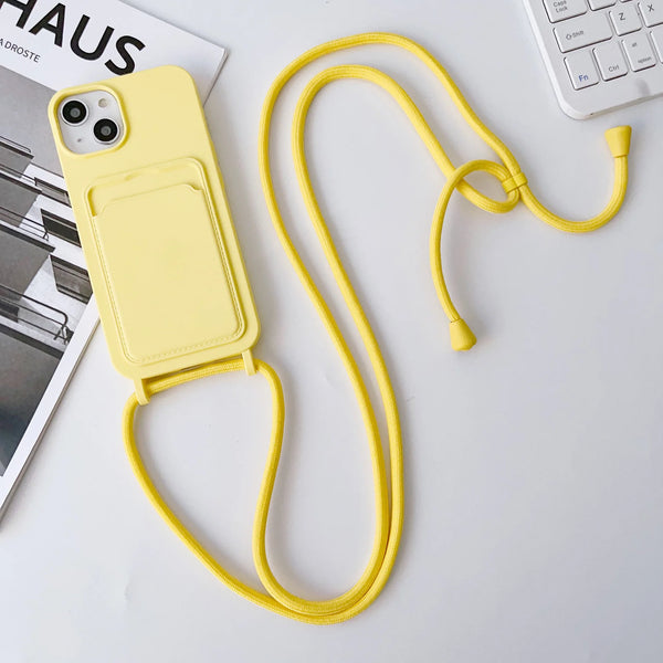 Pastel yellow iPhone case with attached lanyard strap and card storage pocket.