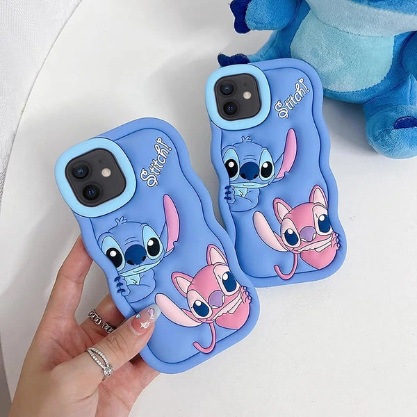 Two blue Stitch silicone iPhone cases displayed together on a soft white surface, highlighting the playful finish.