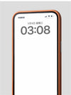 Brown leather-look iPhone case front view with raised edge framing and slim fit