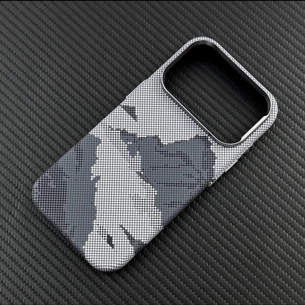 Grey carbon texture iPhone case showing the slim profile and raised camera protection