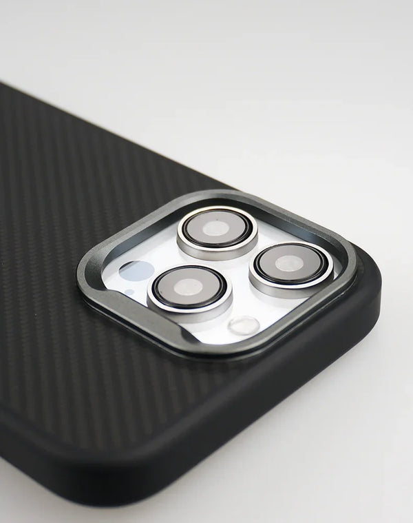 Black carbon-texture iPhone case with slim half-wrapped design and camera protection