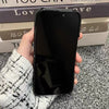 Front view of the black textured iPhone case with a clean, minimal everyday carry look.