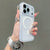 Close view of a translucent frosted iPhone case with white magnetic circle detail