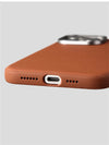 Bottom edge view of the leather-look iPhone case showing precise port cutouts