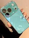 Glossy mint iPhone case with tempered-glass camera protection and magnetic bumper edges