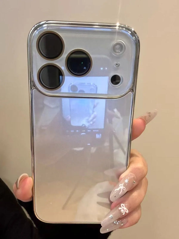 Silver iPhone case with tempered-glass camera guard and polished reflective finish