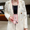 Pink transparent iPhone lanyard case worn crossbody for hands-free carry