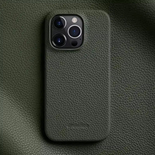 Olive leather iPhone 16 Pro case on dark surface