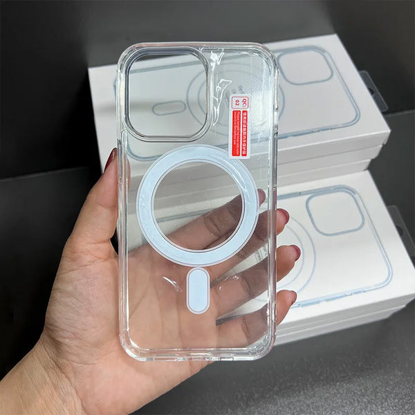 Clear iPhone case held in hand with magnetic ring visible on the back