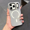 Gray candy-tone MagSafe iPhone case shown in hand with raised camera frame