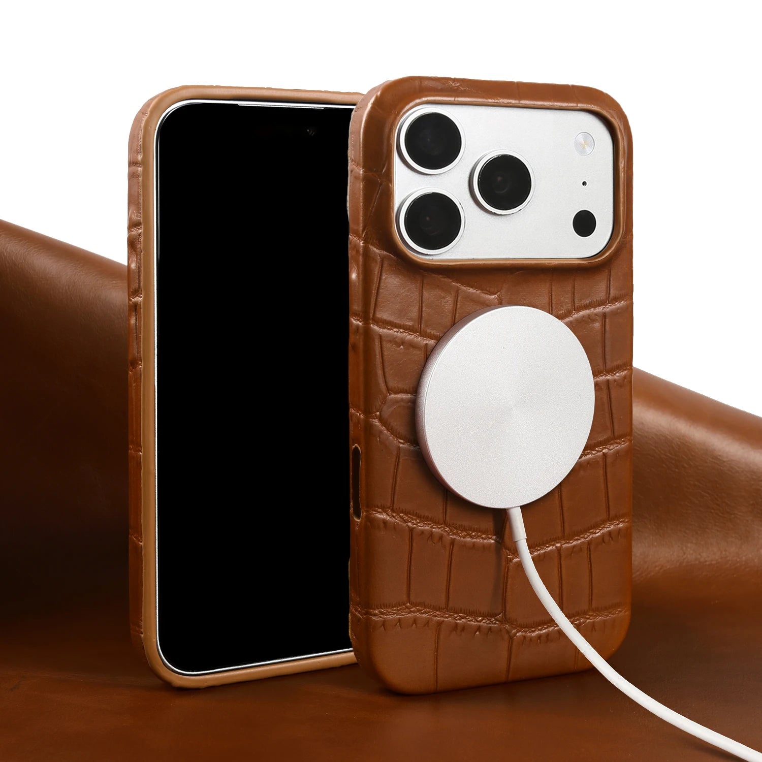 Vintage leather iPhone case with raised camera opening and magnetic charging disc
