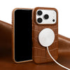 Vintage leather iPhone case with raised camera opening and magnetic charging disc