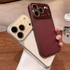 Two iPhone armor cases in cream and wine red showing textured litchi finish
