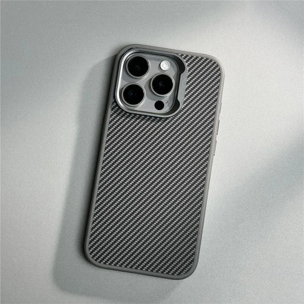 Grey textured iPhone case laid flat, showing the slim profile and carbon-style surface finish