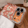 Pink translucent butterfly iPhone case showing the raised camera edge and glossy sparkle finish.