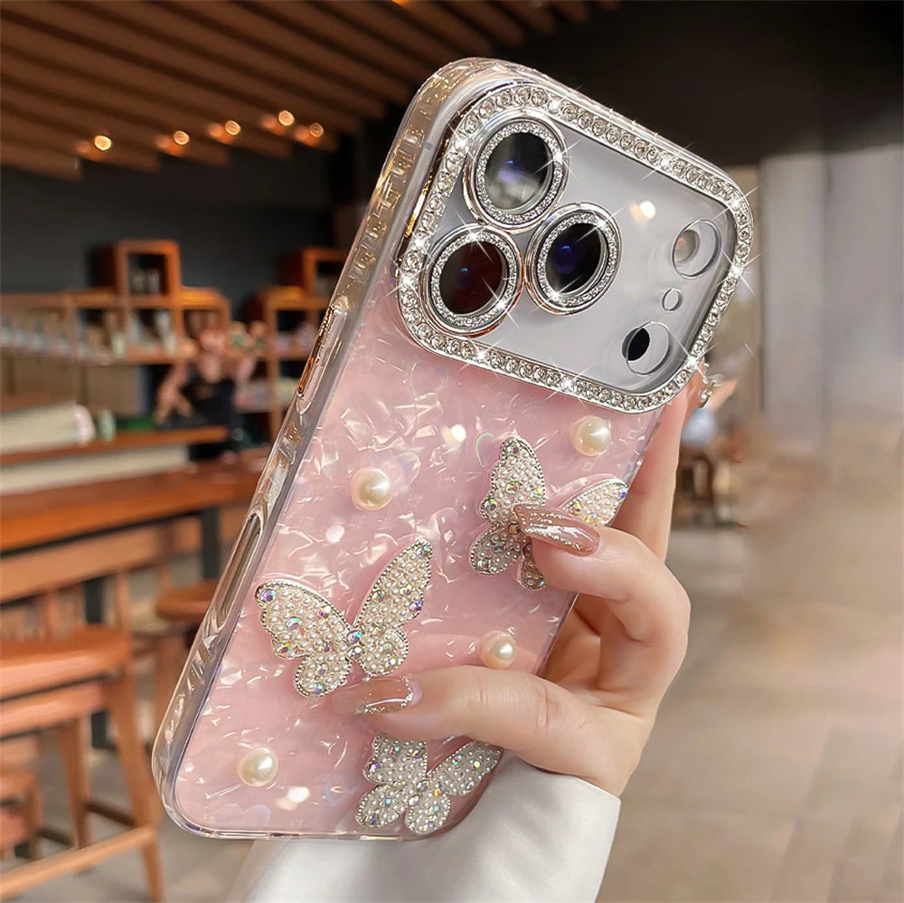 Rhinestone butterfly clear iPhone case with pearl-inspired details and slim half-wrapped fit.