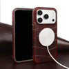 Brown leather iPhone case shown with magnetic charger attached on a white background