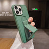 Green iPhone case with foldable stand shown in hand from Trendora