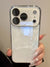 White glossy iPhone case showing raised camera shielding and matte bumper-style protection
