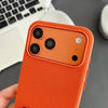 Close-up of orange woven iPhone case with raised camera protection and textured surface