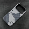 Grey carbon texture iPhone case showing the slim profile and raised camera protection