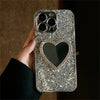 Close-up of silver heart mirror iPhone case with shimmering glitter finish