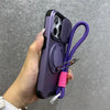 Purple armor iPhone case with magnetic ring stand and camera protection shown in hand