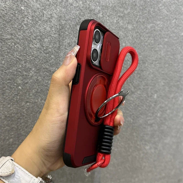 Red armor iPhone case with sliding camera cover and lanyard support shown in hand