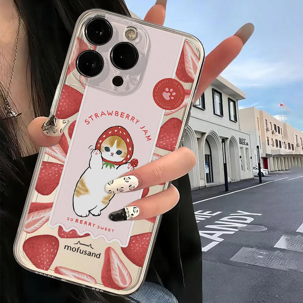 Clear catcore iPhone case in use, showing the transparent finish and cute strawberry cat artwork.