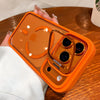 Bright orange translucent MagSafe bracket case viewed from the back on an iPhone