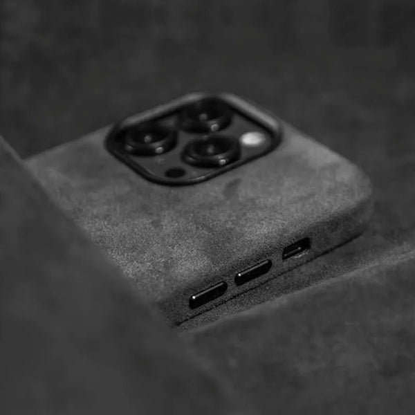 Dark grey leather magnetic iPhone case displayed with minimal, understated styling