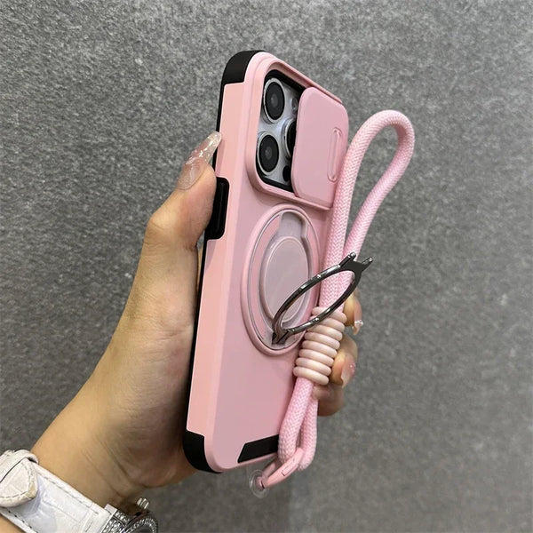 Pink armor iPhone case with lanyard and sliding camera cover shown in hand