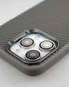 Angled view of the grey case highlighting the raised camera guard and textured back