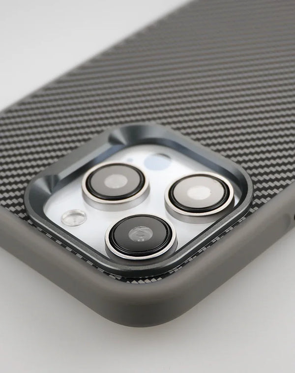 Angled view of the grey case highlighting the raised camera guard and textured back