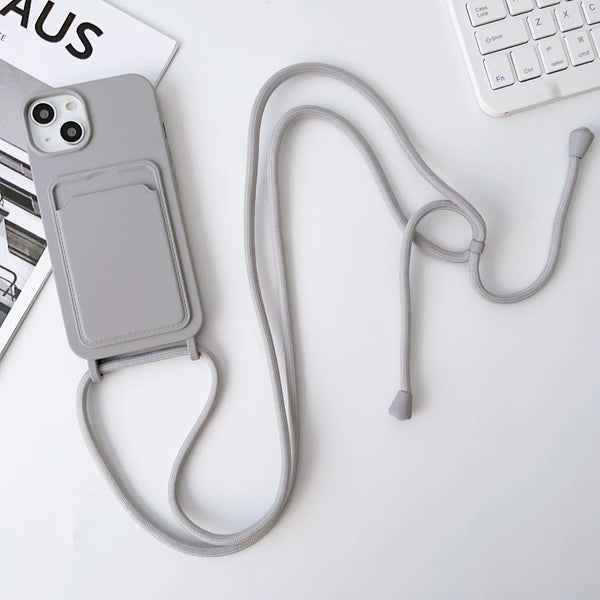 Light gray iPhone case with hands-free strap and slim built-in card compartment.