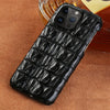 Crocodile leather iPhone case in a polished black finish, highlighting the tactile pattern and slim profile.