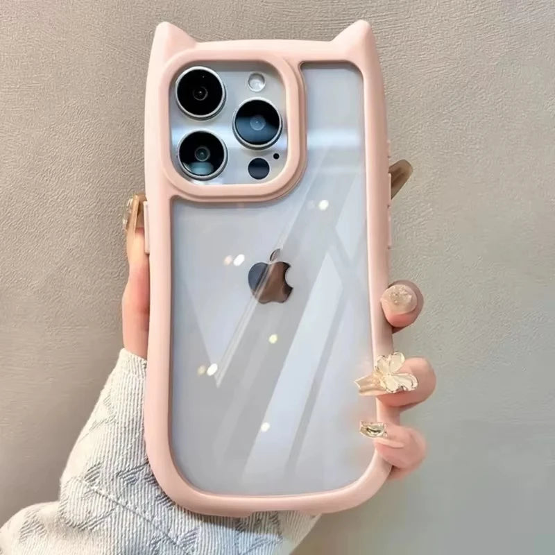 Pink cat-ear silicone case with transparent back on an iPhone