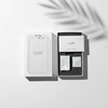 Screen protector flat lay with premium packaging box on white background