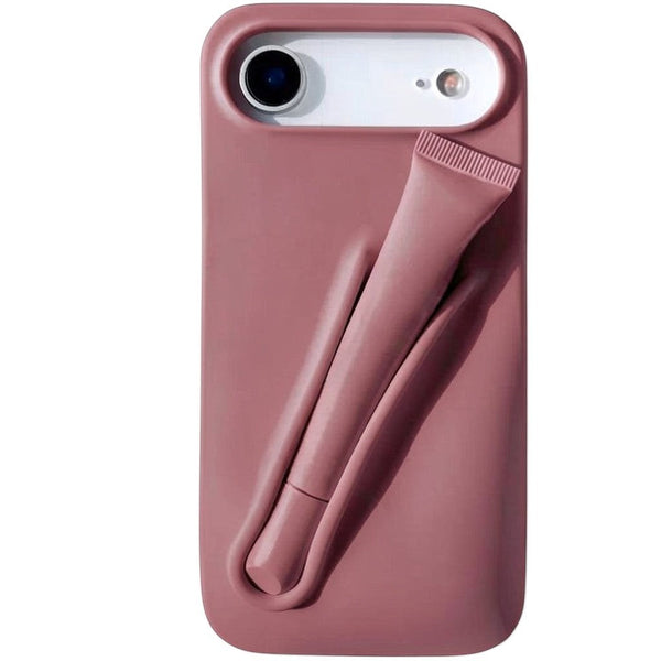 Trendora dusty rose matte silicone iPhone case with built-in holder for lip gloss and raised camera protection.
