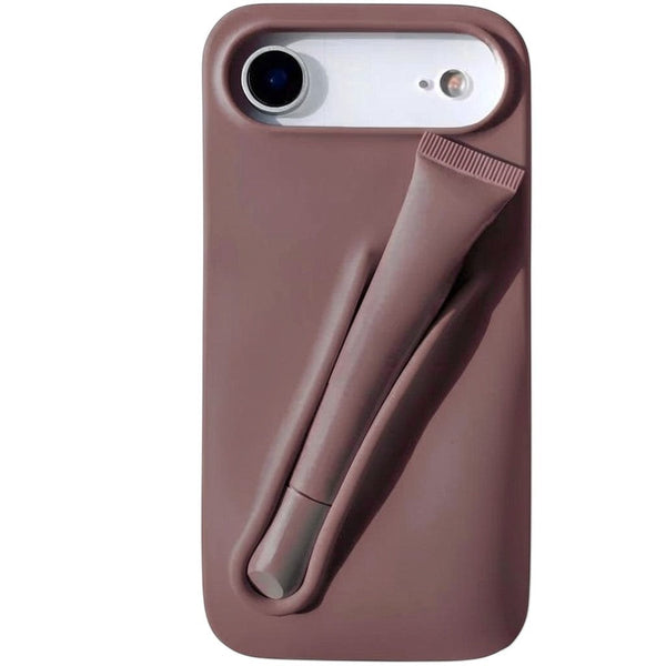 Trendora matte silicone iPhone case in dusty rose with a built-in holder for lip gloss and raised camera protection.