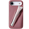 Trendora dusty rose matte silicone iPhone case with built-in holder for lip gloss and raised camera protection.